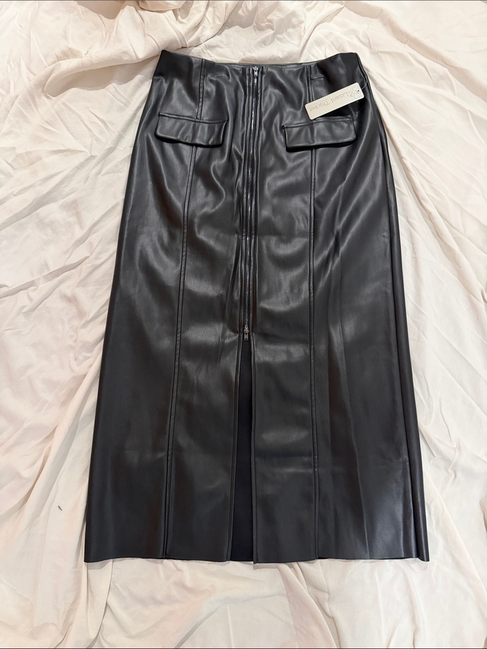 High-Waist Black Faux Leather Midi Skirt with Front Zip and Flap Pockets